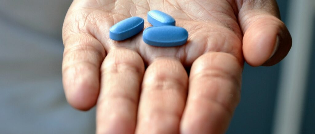 blue pill on a hand