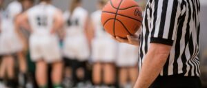 Referee holding basketball