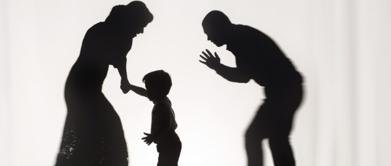 Silhouettes of quarreling parents and little child