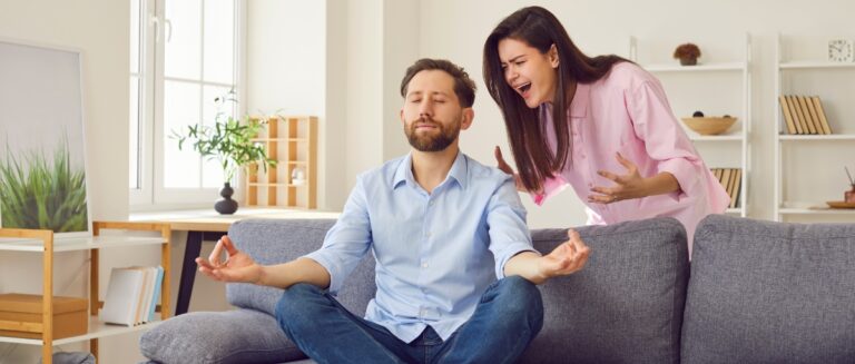 Woman yelling and man trying to medidate